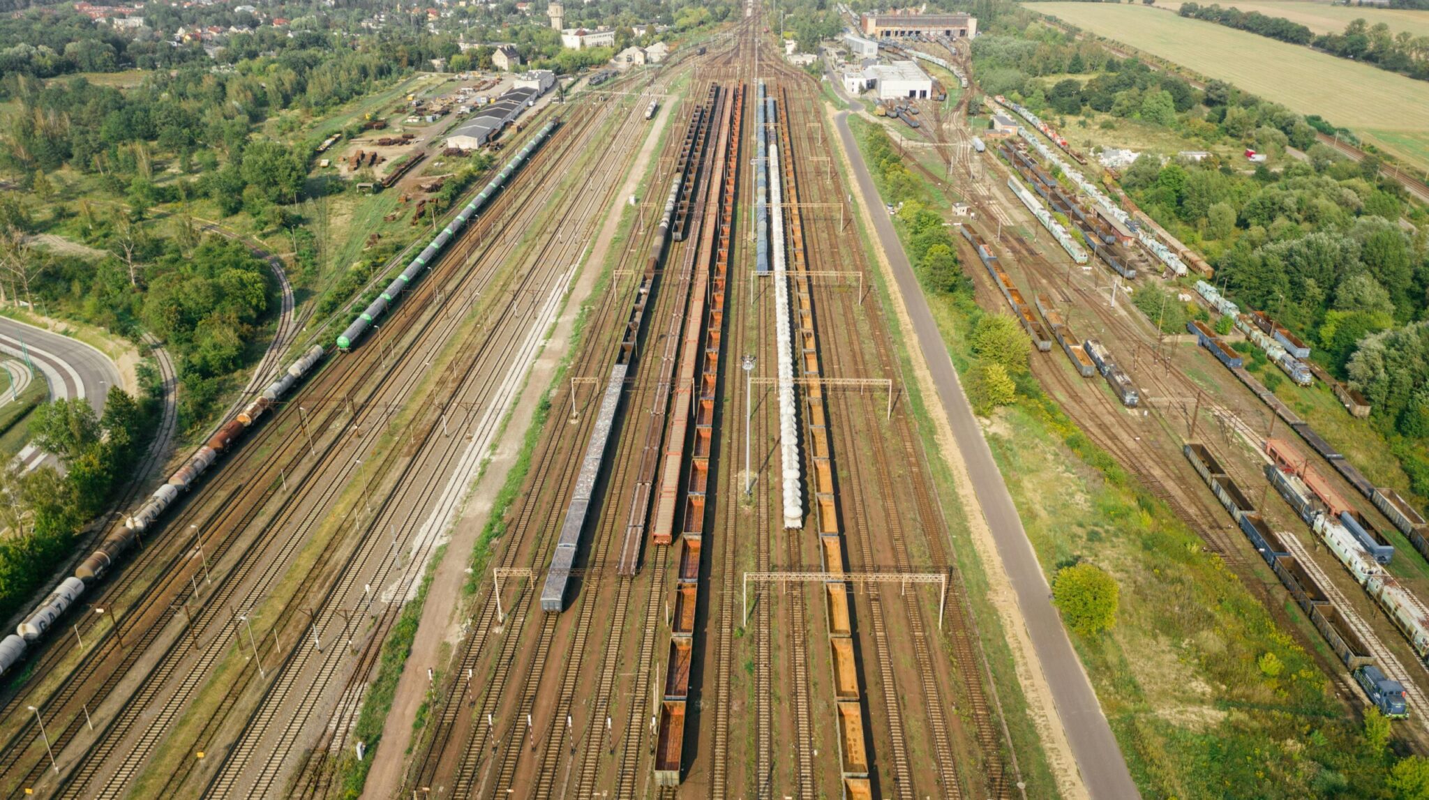 Explore the extensive railway yard in Poznań, showcasing logistics and transportation infrastructure.